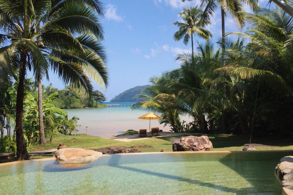 View of the beach from a pool at Soneva Kiri