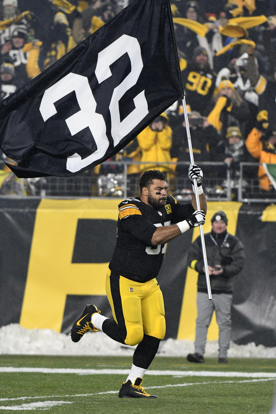 Pittsburgh Steelers defensive tackle Cameron Heyward (97) is introduced before an NFL football game against the Las Vegas Raiders in Pittsburgh, Saturday, Dec. 24, 2022. (AP Photo/Don Wright)