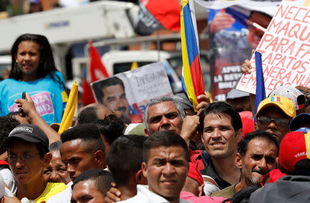 Supporters of Venezuela's President Nicolas Maduro attend his closing campaign rally in Caracas, Venezuela, May 17, 2018. REUTERS/Carlos Jasso