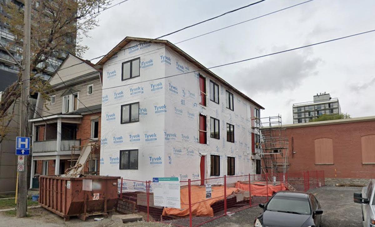 A four-unit apartment building rises in Ottawa in this 2021 file photo. Federal housing officials want Charlottetown to encourage more of this type of building in all of its neighbourhoods, even those now made up of mostly single-family homes. (Google - image credit)