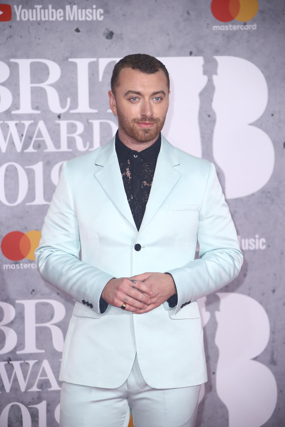 Singer Sam Smith poses for photographers upon arrival at the Brit Awards in London, Wednesday, Feb. 20, 2019. (Photo by Joel C Ryan/Invision/AP)