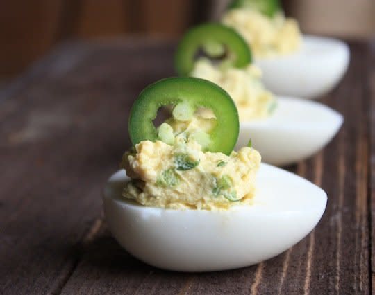 <strong>Get the <a href="http://raisedonaroux.com/fingerfood-jalapeno-deviled-eggs/" target="_blank">Jalapeño Deviled Eggs recipe from Raised on a Roux</a></strong>