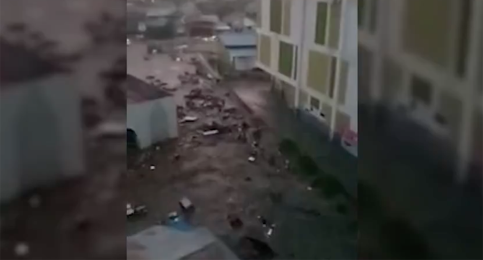 Tsunami wave at Palu in Sulawesi Indonesia, sweeps away homes.