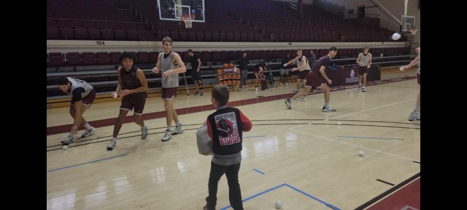 The Bellarmine men's basketball team partakes in a snowball fight with Seth Walsh on his birthday.