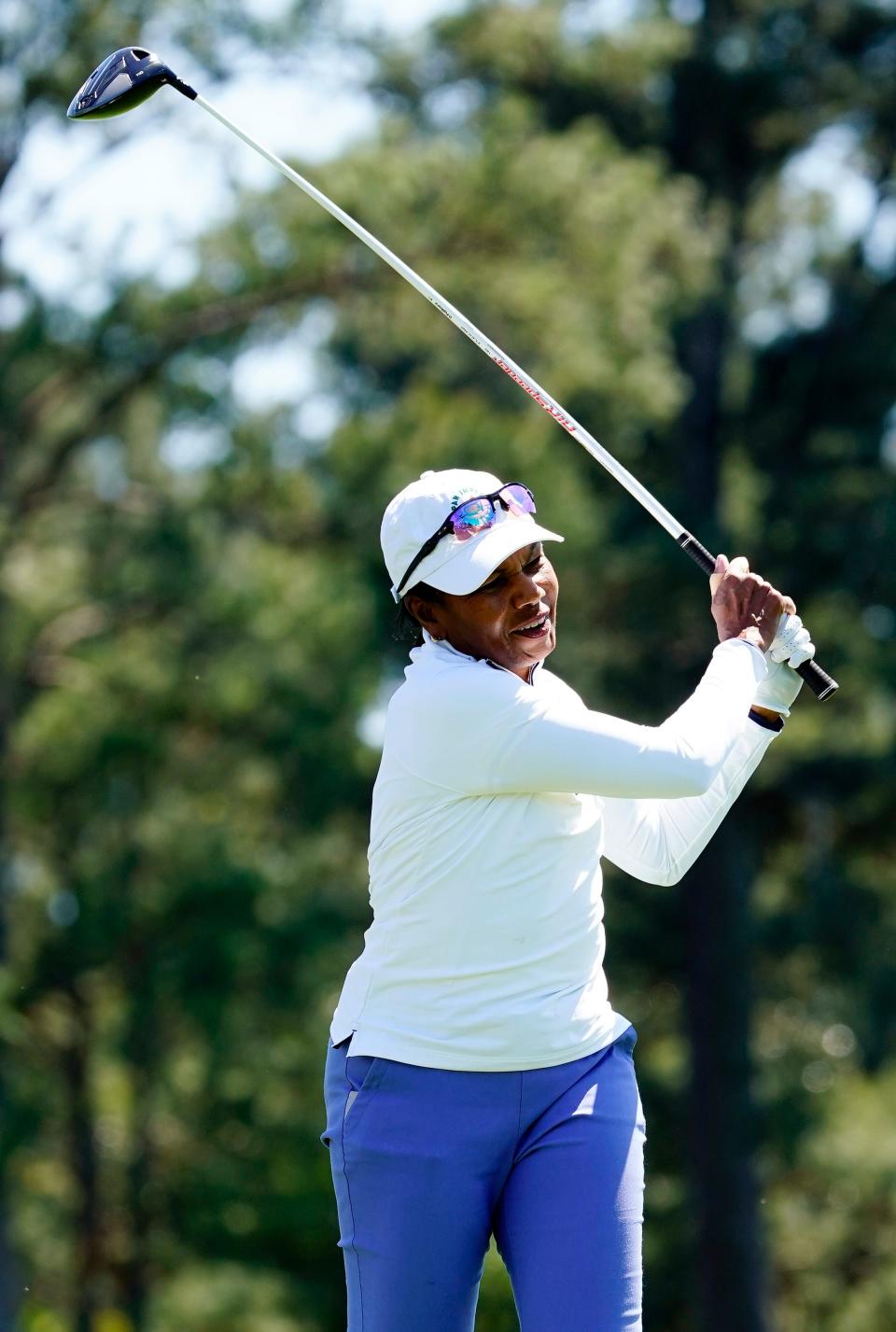 Apr 3, 2022; Augusta, Georgia, USA; Condoleezza Rice tees off on no. 1 as she plays a round with Bubba Watson following the Drive, Chip & Putt Finals at Augusta National Golf Club.
