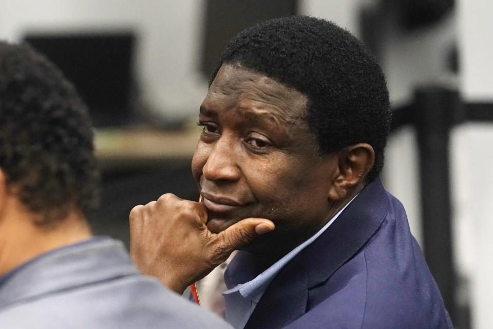 FILE - Dale Holness, waits for results of a machine recount at the Voting Equipment Center in Lauderhill, Fla., on Friday, Nov. 5, 2021. The Democratic Florida congressional candidate who lost a special election primary by five votes has filed two lawsuits asking that the result be thrown out, alleging his opponent's support of a universal income plan amounted to bribing voters. Dale Holness alleges Sheila Cherfilus-McCormick’s support of a proposal that would pay most U.S. adults $1,000 a month was an attempt to illegally bribe voters. (AP Photo/Marta Lavandier, file)