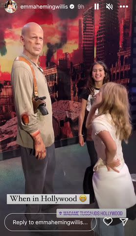 <p> Emma Heming Willis/Instagram</p> Bruce and Emma Heming Willis' daughters with the actor's wax figure at Madame Tussauds