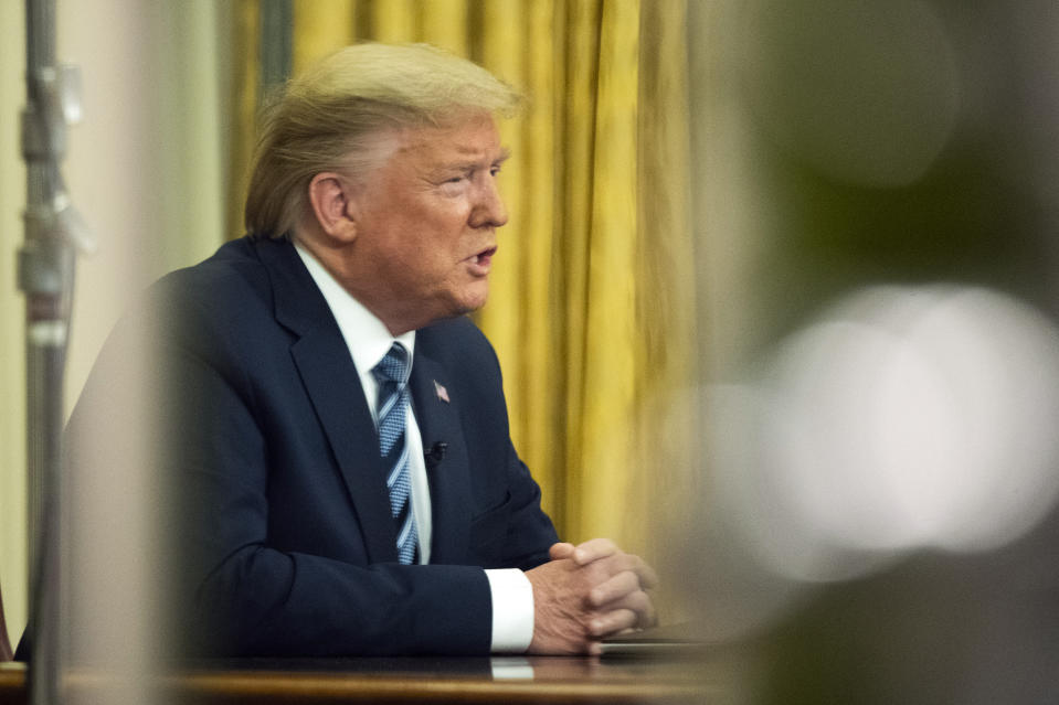 FILE - In this March 11, 2020, file photo President Donald Trump addresses the nation from the Oval Office at the White House in Washington. For only the second time as president, Trump addressed the nation in a formal Oval Office speech on March 11. The U.S., he told Americans, would “expeditiously defeat this virus. (AP Photo/Manuel Balce Ceneta, File)