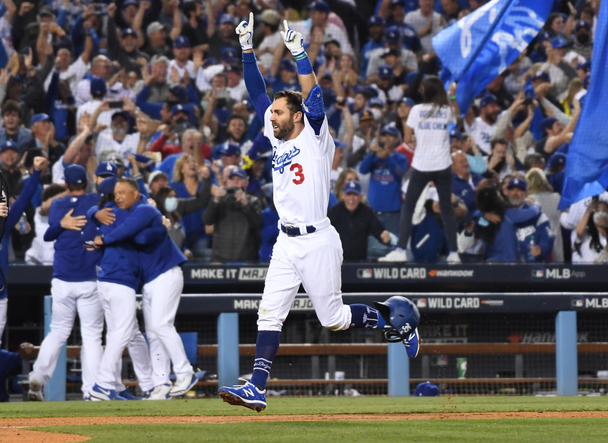 Los Angeles, CA - October 06: Los Angeles Dodgers Chris Taylor rounds the bases after hitting the game-winning two-run home run during the ninth inning against the St. Louis Cardinals at Dodger Stadium on Wednesday, Oct. 6, 2021 in Los Angeles, CA. (Wally Skalij / Los Angeles Times via Getty Images)