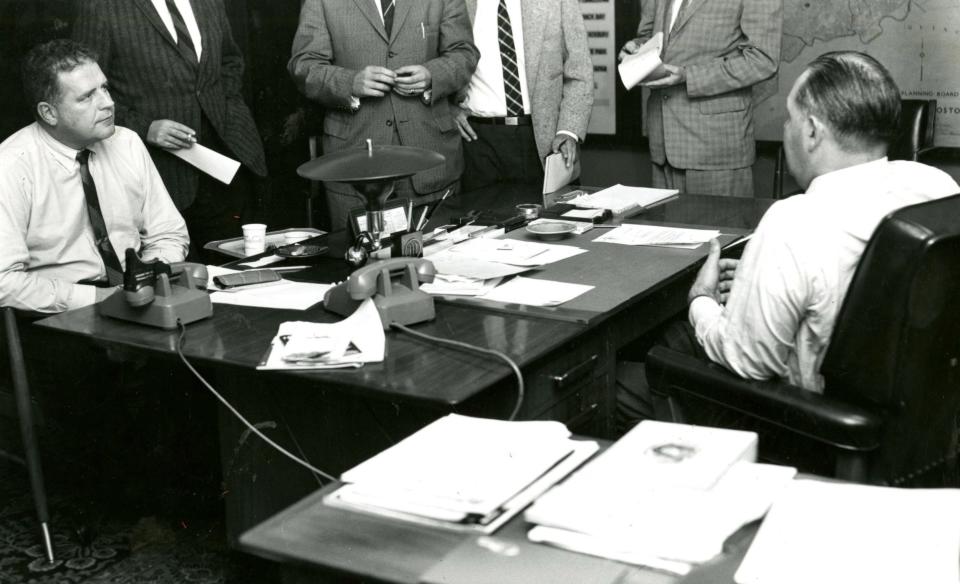 Boston police detectives meet to discuss the strangling murders in 1962.