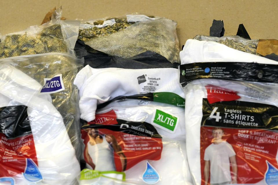 Marijuana hidden in underwear packaging is shown at the U.S. Customs and Border Protection overseas mail inspection facility at Chicago's O'Hare International Airport Feb. 23, 2024, in Chicago. The explosive growth of cross-border e-commerce involving major China-backed players such as Shein and Temu has caught the attention of the U.S. lawmakers amid a bitter U.S.-China trade war and cast a spotlight on a tax rule that critics say has allowed hundreds of millions of China-originated packages to enter the U.S. market each year without duty and without reliable information for lawfulness. (AP Photo/Charles Rex Arbogast)