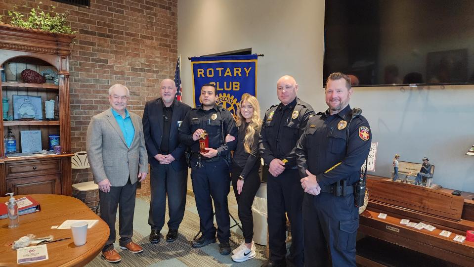 Members of the Amarillo Police Department stand with the 2022 Amarillo South Rotary  Police Officer of the Year Enrique Gonzalez Thursday in Amarillo.