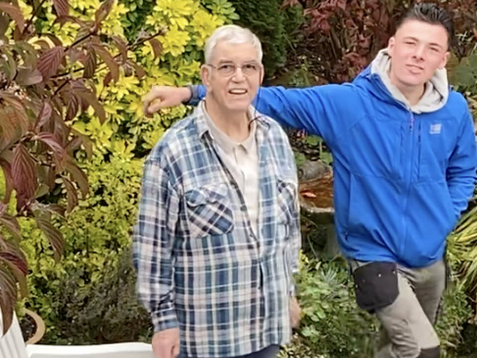 John Bray, 82, next to one of the cowboy builders who targeted him and other elderly people in a string of fraudulent jobs. (SWNS)