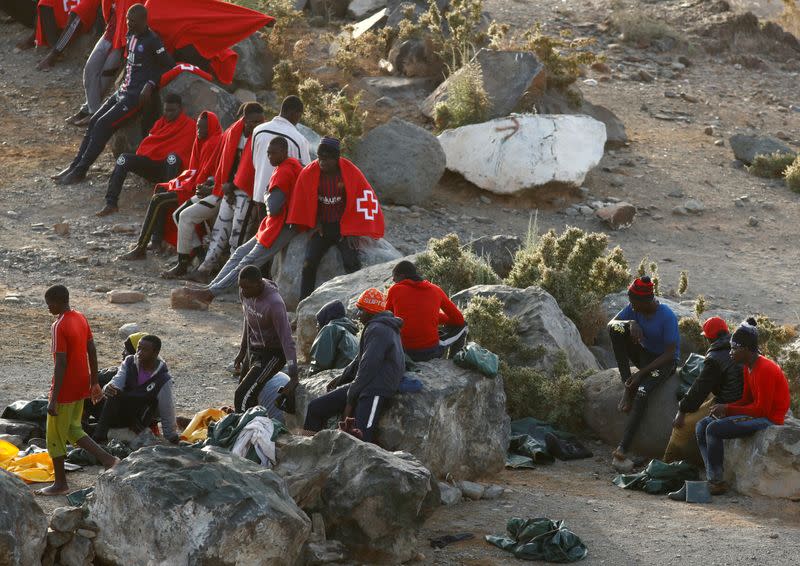 Group of immigrants is pictured at Las Carpinteras beach on the island of Gran Canaria