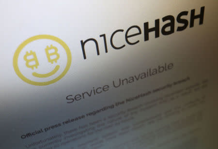 A notice announcing that service is unavailable is displayed on the website of Slovenian cryptocurrency mining firm NiceHash, which said it had suffered a hack of its Bitcoin wallet, in photo illustration December 7, 2017. REUTERS/Chris Helgren