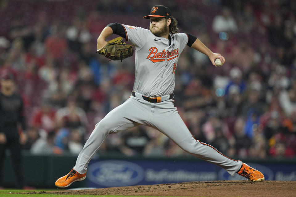 Baltimore Orioles starting pitcher Cole Irvin throws in the first inning of a baseball game against the Cincinnati Reds, Friday, May 3, 2024, in Cincinnati. (AP Photo/Carolyn Kaster)