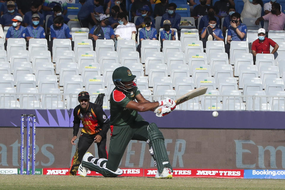 Bangladesh's Mohammad Mahmudullah bats during the Cricket Twenty20 World Cup match between Bangladesh and Papua New Guinea in Muscat, Oman, Thursday, Oct. 21, 2021. (AP Photo/Kamran Jebreili)