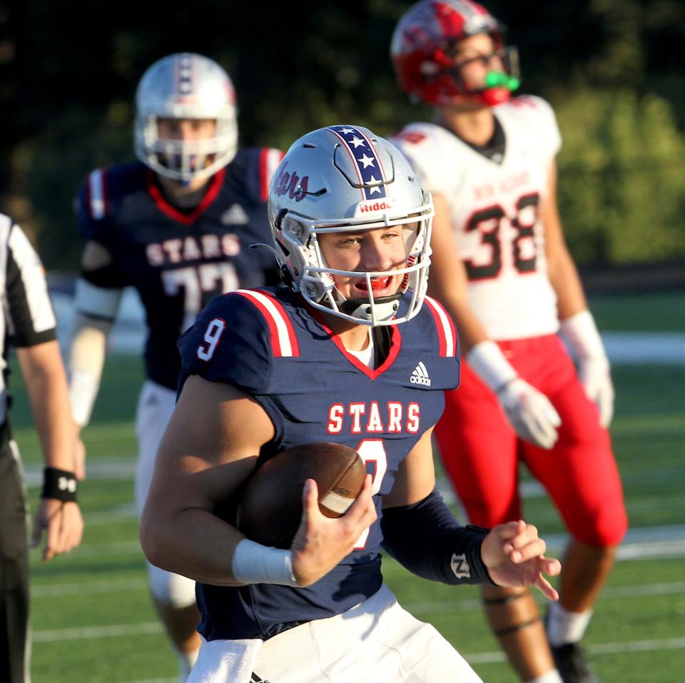 Bedford North Lawrence's Memphis Louden (9) runs the ball in for a first half touchdown. BNL defeated HHC foe New Albany 52-14 Friday evening. BNL's next game will be at Seymour next Friday.