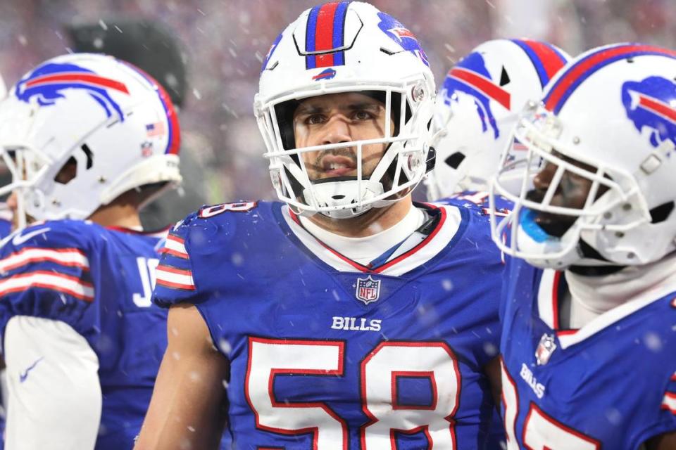 Buffalo Bills Matt Milano makes a face as he watches the action on the large screen hanging over the field. The Bills hosted the Cincinnati Bengals in their division playoff game and lost, Jan. 22, 2023. Bills Matt Milano Tina MacIntyre-Yee/Rochester Democrat and Chronicle/Tina MacIntyre-Yee/Rochester Democrat and Chronicle / USA TODAY NETWORK