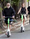 <p>Russell Crowe and girlfriend Britney Theriot take a scooter ride around Rome on Sept. 27.</p>