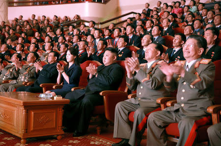 North Korean leader Kim Jong Un claps during a celebration for nuclear scientists and engineers who contributed to a hydrogen bomb test, in this undated photo released by North Korea's Korean Central News Agency (KCNA) in Pyongyang on September 10, 2017. KCNA via REUTERS