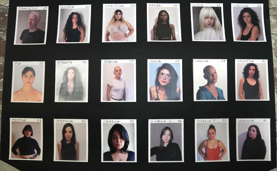 Fotos de modelos en una pared durante una sesión de la agencia de modelos "L'Imperfetta (La imperfecta) en Roma, el 7 de febrero de 2023. (Foto AP/Alessandra Tarantino)