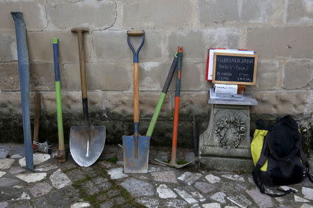 Tools of members of the Association for the Recovery of Historical Memory (ARHM) are seen during the exhumation of a grave at Guadalajara's cemetery, Spain, January 19, 2016. REUTERS/Juan Medina