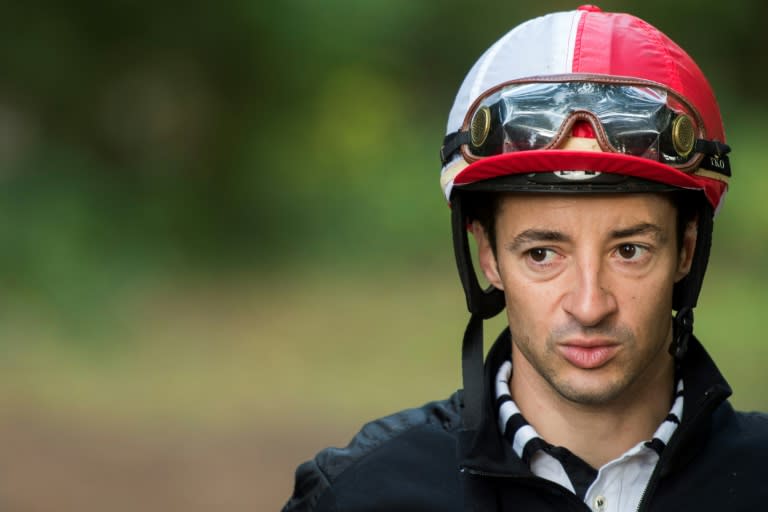 French jockey Christophe Lemaire rides Japanese owned horse Satono Diamond during a training session at Chantilly on September 6, 2017, ahead of the Prix de l'Arc de Triomphe