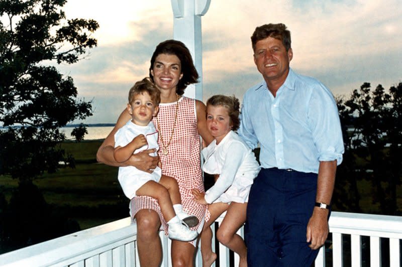 President John F. Kennedy and first lady Jacqueline Kennedy with their children Caroline Kennedy and John F. Kennedy Jr. pose for a photo in Hyannis Port, Mass., on August 4, 1962. On September 12, 1953, the then-senator married Jacqueline Lee Bouvier at St. Mary's Church in Newport, R.I. File Photo by Cecil Stoughton/UPI