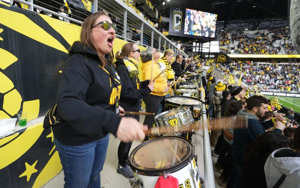 Heidi Tybee drums as part of the Nordecke, the Columbus Crew SC rowdy fan section, on April 2, 2022 inside Lower.com Field.
