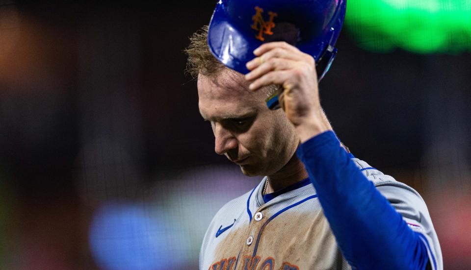 New York Mets first baseman Pete Alonso (20) returns to the dugout after turning into a double play during the seventh inning against the Philadelphia Phillies at Citizens Bank Park.