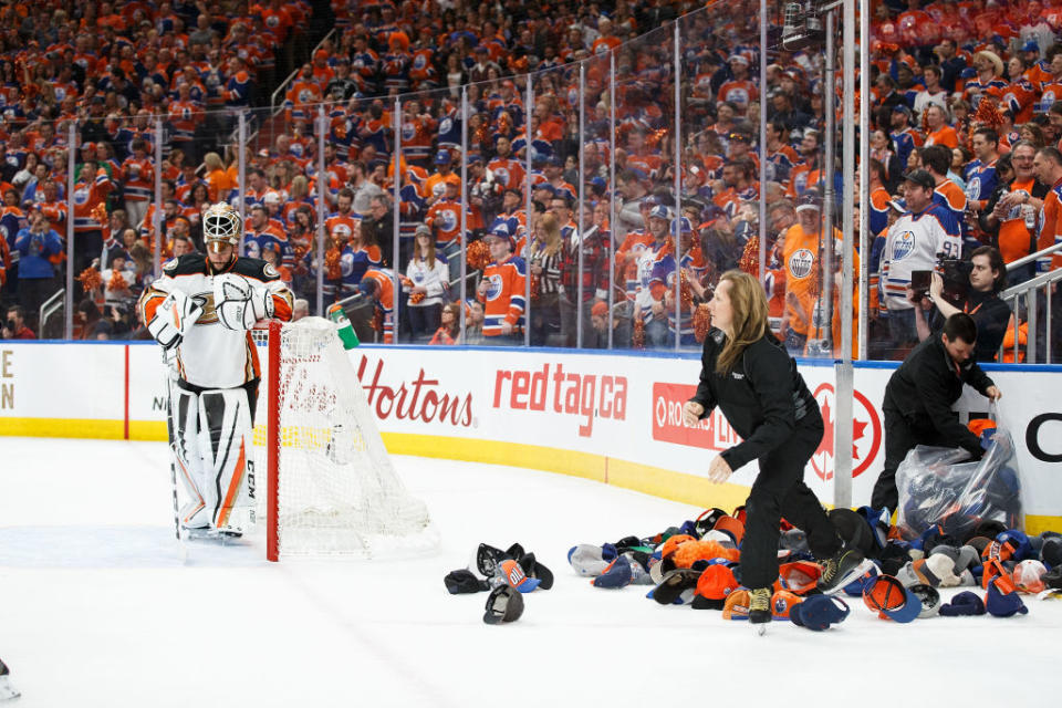 EDMONTON, AB – MAY 7: Goalie Jonathan Bernier #1 of the Anaheim Ducks looks on as attendants pick up hats after Leon Draisaitl of the Edmonton Oilers (not pictured) scored a hat trick in Game Six of the Western Conference Second Round during the 2017 NHL Stanley Cup Playoffs at Rogers Place on May 7, 2017 in Edmonton, Alberta, Canada. (Photo by Codie McLachlan/Getty Images)