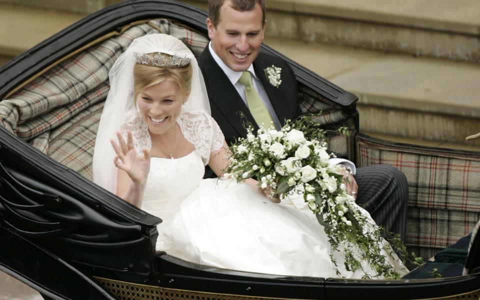 Peter Phillips and Autumn Kelly leave St George's Chapel in Windsor after their marriage vows in May 2008 - SANG TAN/AFP