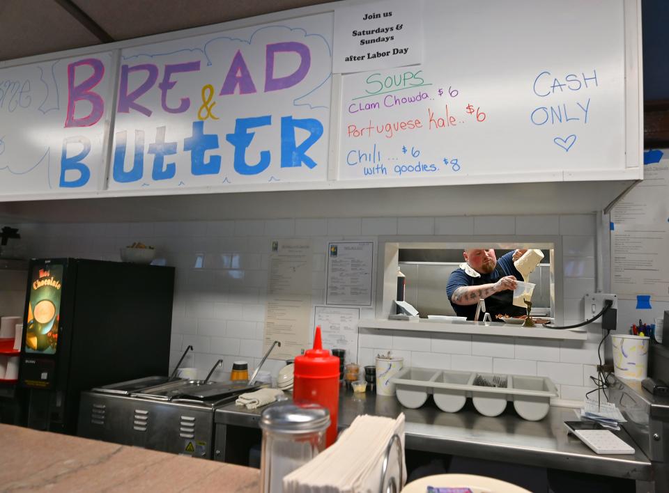 At Bread and Butter Diner cook Chris "Bubba" Sparks makes pancake batter in the kitchen.