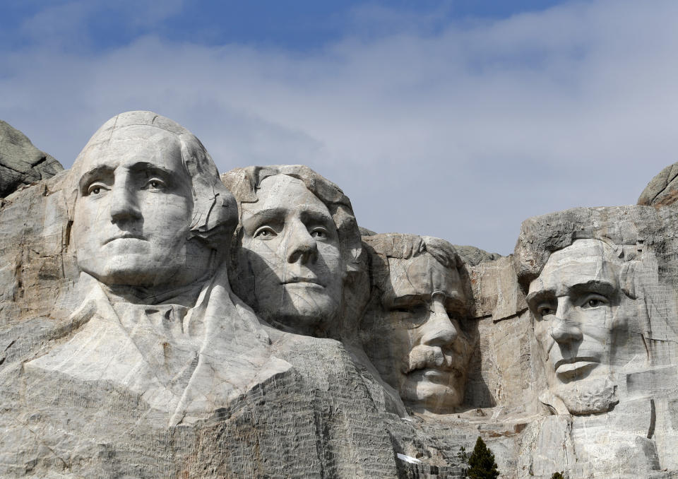 FILE - This March 22, 2019, file photo shows Mount Rushmore in Keystone, S.D. The Trump administration on Thursday, June 18, 2020, rejected imposing federal drinking-water limits for a chemical used in fireworks and other explosives and linked to brain damage in newborns. The contaminant is perchlorate, a component in rocket fuel, ammunition and other explosives, including fireworks. The Associated Press found one high-profile example of that on Thursday, reviewing a 2016 U.S. Geological Survey report that links high levels of perchlorate contamination in the water at Mount Rushmore national memorial with past years of fireworks displays there. (AP Photo/David Zalubowski, File)
