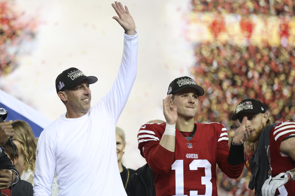 San Francisco 49ers head coach Kyle Shanahan, left, and quarterback Brock Purdy (13) celebrate after the NFC Championship NFL football game against the Detroit Lions in Santa Clara, Calif., Sunday, Jan. 28, 2024. (AP Photo/Jed Jacobsohn)