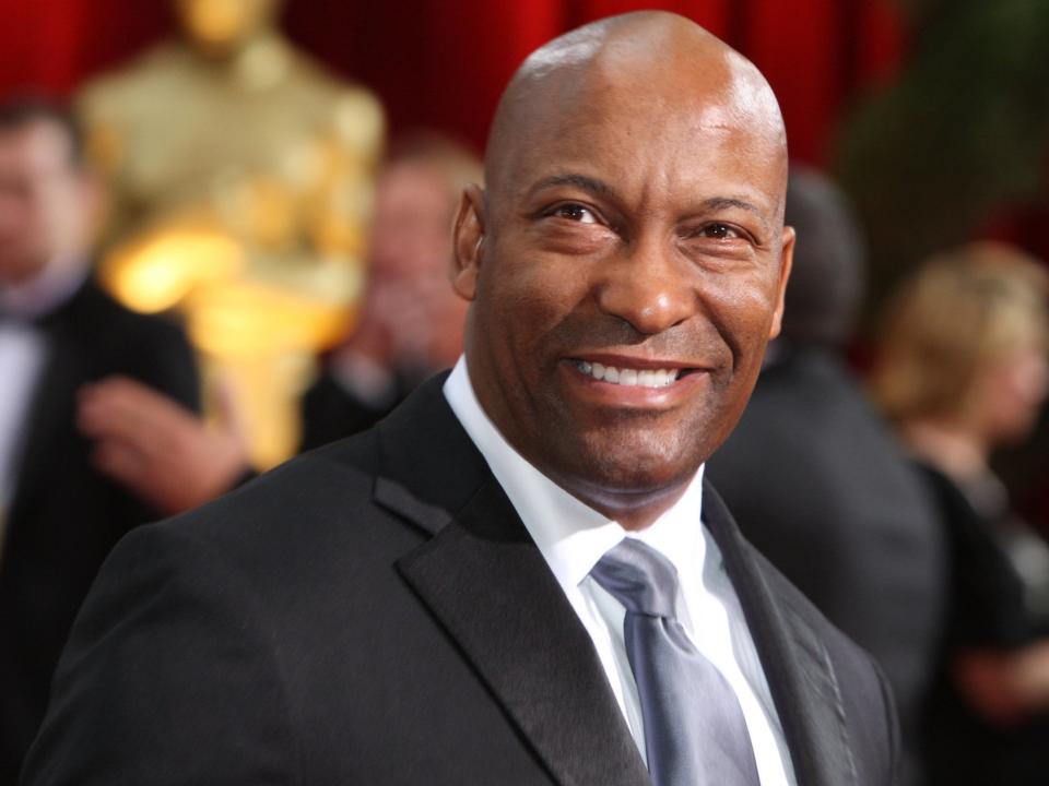 John Singleton’s powerful directorial 1991 debut, Boyz n the Hood, earned him two Oscar nominations and was considered groundbreaking for its humane depiction of the lives of young black men on the violent streets of South Central Los Angeles.Singleton, who has died aged 51, was the first African American and the youngest-ever Academy Award nominee for Best Director. He wrote the Boyz n the Hood screenplay, which was also an Oscar contender, as a student at the University of Southern California. In college, he had won scriptwriting prizes, which led to a three-picture deal with Columbia Pictures and $6.5m (£5m) to make Boyz n the Hood.He was 22, had never made a movie before and insisted on directing the film. He proved persuasive in negotiations with studio executives.“I’m a writer first, and I direct in order to protect my vision,” he told The New York Times. “It’s my story, I lived it. What sense would it have made to have some white boy impose his interpretation on my experience?”Singleton grew up in a rough part of Los Angeles and said his love of movies – his mother’s apartment was next to a drive-in theatre – saved him from a life of delinquency. Boyz n the Hood reflected many disparate influences, including François Truffaut’s The 400 Blows (1959) and Rob Reiner’s Stand by Me (1986), both of which featured children forced by tragic circumstance to confront the starker world of adult realities.He assembled a cast that included Cuba Gooding Jr, Angela Bassett, Tyra Ferrell, Morris Chestnut and Laurence Fishburne. He also recruited Ice Cube, then known primarily as a hip-hop performer and who was sceptical of the eager young director who pursued him for a leading role as a neighbourhood enforcer who seeks to avenge a gang-related killing.“You know, I just felt this dude was a little delusional,” Ice Cube told Vanity Fair in 2016, reflecting on Singleton’s single-minded determination. “It’s just a pipe dream – that’s what I was thinking.”But Singleton exuded such confidence that the singer read the script and showed up for a second audition, which made Columbia executives more enthusiastic about the film’s potential.Singleton filmed on location in neighbourhoods beset by violence, in which drugs and police brutality were rife, yet he described the movie as “my American Graffiti, my coming-of-age story.” He enlisted local gang members to add an extra edge of realism to the clothes and dialogue.Boyz focused on three black teenagers on the cusp of adulthood: a football star named Ricky Baker (Chestnut); his half brother, Doughboy (Ice Cube); and Tre Styles (Gooding), Singleton’s alter ego and the only young man in the film with a father present in his life.The film sought to portray the complicated bonds of male friendship – and the sorrow of the boys’ mothers – in a society in which, as a graphic at the beginning of the film pointed out, one in every 21 young African American men would die by gunfire.Critic Roger Ebert pronounced the movie not just a “brilliant directorial debut, but an American film of enormous importance”. The characters, he wrote, “live in a neighbourhood where violence is a fact of life, where the searchlights from police helicopters are like the guard lights in a prison camp, where guns are everywhere, where a kid can go down to the corner store and not come home alive”.When Boyz n the Hood was released, it was considered a breakthrough in its depiction of a world previously overlooked by Hollywood filmmakers, even though the movie-making capital was only miles away. Singleton joined a group of other African-American directors – among them Spike Lee, Robert Townsend and Mario Van Peebles – who were making films about racial justice and the ordinary lives of black people.But Singleton’s huge mainstream success – Boyz reportedly grossed $100m – vaulted him to the top of the pecking order. He was 24 when he was nominated for his Academy Awards, two years younger than Orson Welles was when he received a Best-Director nomination in 1942 for Citizen Kane.Singleton lost the directing Oscar to Jonathan Demme for Silence of the Lambs and the screenplay Oscar to Callie Khouri for Thelma and Louise, but his prospects seemed limitless.> I want to become much more than a filmmaker. My ultimate goal is to run my own studioJohn Singleton“I got out of film school in spring 1990, so they were looking for the next Spike Lee, the next black filmmaker with the vision to make a mark in commercial Hollywood,” Singleton told The Guardian in 2018. “So I was the guy. They gave me a chance, gave me $6m to make a movie, and I knocked it out of the park!”To far more mixed critical results, Singleton went on to direct films including Poetic Justice (1993) with Tupac Shakur and Janet Jackson, and Rosewood (1997), about the massacre of residents in a black town in 1920s Florida.Singleton was criticised for turning to blatantly commercial filmmaking, such as a 2000 remake of the “blaxploitation” action hit Shaft starring Samuel L Jackson, Baby Boy (2001) with Tyrese Gibson and Taraji Henson, 2 Fast 2 Furious (2003), a sequel to the car-chase cop thriller The Fast and the Furious, and Four Brothers, starring Mark Wahlberg about four adopted brothers – both black and white – who avenge the death of their mother.“While you can’t blame a director for giving up on the sort of serious movies that didn’t make any money,” film critic Stephen Whitty wrote in the Newark Star-Ledger, “there’s a feeling that a smart director has dumbed himself down. Yes, he works. But there’s no longer any real message to that work.”In 2005, Singleton bankrolled and produced the box-office hit Hustle & Flow, the story of a Memphis pimp and aspiring rap star written and directed by Craig Brewer, and in 2017 he was executive producer of A&E’s documentary LA Burning: The Riots 25 Years Later, which examined racial violence in Los Angeles. The same year, Singleton created the FX television series Snowfall, set amid the 1980s crack cocaine era in Los Angeles, which is still airing.“I want to become much more than a filmmaker,” he told Ebony magazine in 1995. “My ultimate goal is to run my own studio.”John Daniel Singleton was born on 6 January 1968, in Los Angeles. His father managed a pharmacy and later became a mortgage broker; his mother worked in pharmaceutical sales. He lived alternately with both parents, who were not married.Drawn to movies at an early age, Singleton recalled accompanying his mother to see Cooley High, a 1975 film about high school friends with a tragic ending.“I looked at my mother and I said, ‘Why are you crying?,’ “ he told Vanity Fair. “And she said, ‘Because it’s such a good movie.’ So I start thinking, when I get to make a movie, I got to make people cry. I got to make them feel something.”He was 9 when he saw Star Wars for the first time, and from then on he was determined to become a filmmaker. In addition to Stand by Me and Truffaut’s The 400 Blows, another touchstone for Singleton was writer-director John Hughes’s The Breakfast Club.“I didn’t feel alienated by the fact that they were all white kids,” Singleton told writer David Kamp in 2018 for the Criterion Collection, a video distribution outlet. “They were just teens finding their way into adulthood – like I was.”He had a short-lived marriage to actress Akosua Busia, the daughter of a prime minister of Ghana. Survivors include a daughter from his marriage and six children from other relationships; his parents, Danny Singleton and Shelia Ward, who acted as her son’s business manager; a brother; and a grandfather.Singleton never recaptured the early acclaim of Boyz n the Hood – which the Library of Congress’s National Film Registry placed on its list of culturally, historically or aesthetically significant films – but he said his filmmaking dreams had been fulfilled.“I wanted to be taken seriously as a filmmaker, and my first film was taken so seriously”, he said in 2005, “so I kept feeling like each film had to be more serious than the last one. Finally I said, you know what, I’m in this business because movies saved me from delinquency, movies saved my life. I just want to make movies. It doesn’t matter if they’re serious or not.”John Singleton, film director and screenwriter, born 6 January 1968, died 29 April 2019© Washington Post