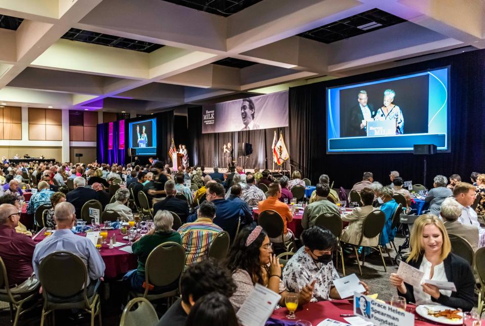 Jeff Hocker and Ellen Wolf address the crowd at the 10th annual Harvey Milk Coachella Valley Diversity Breakfast on May 11, 2022.