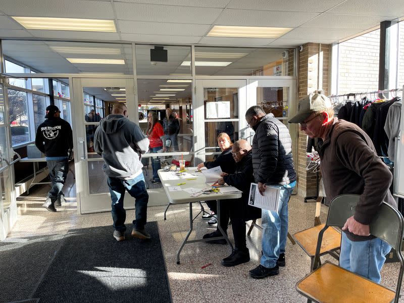 Local union members of United Auto Workers (UAW) arrive at Starbuck Middle School to vote on CNH Industrial latest contract offer in Racine