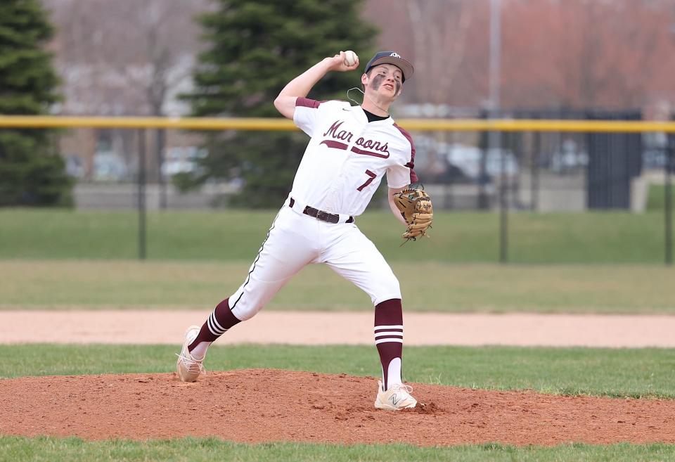 Holland Christian's Hudson Lubbers pitches against Hamilton.