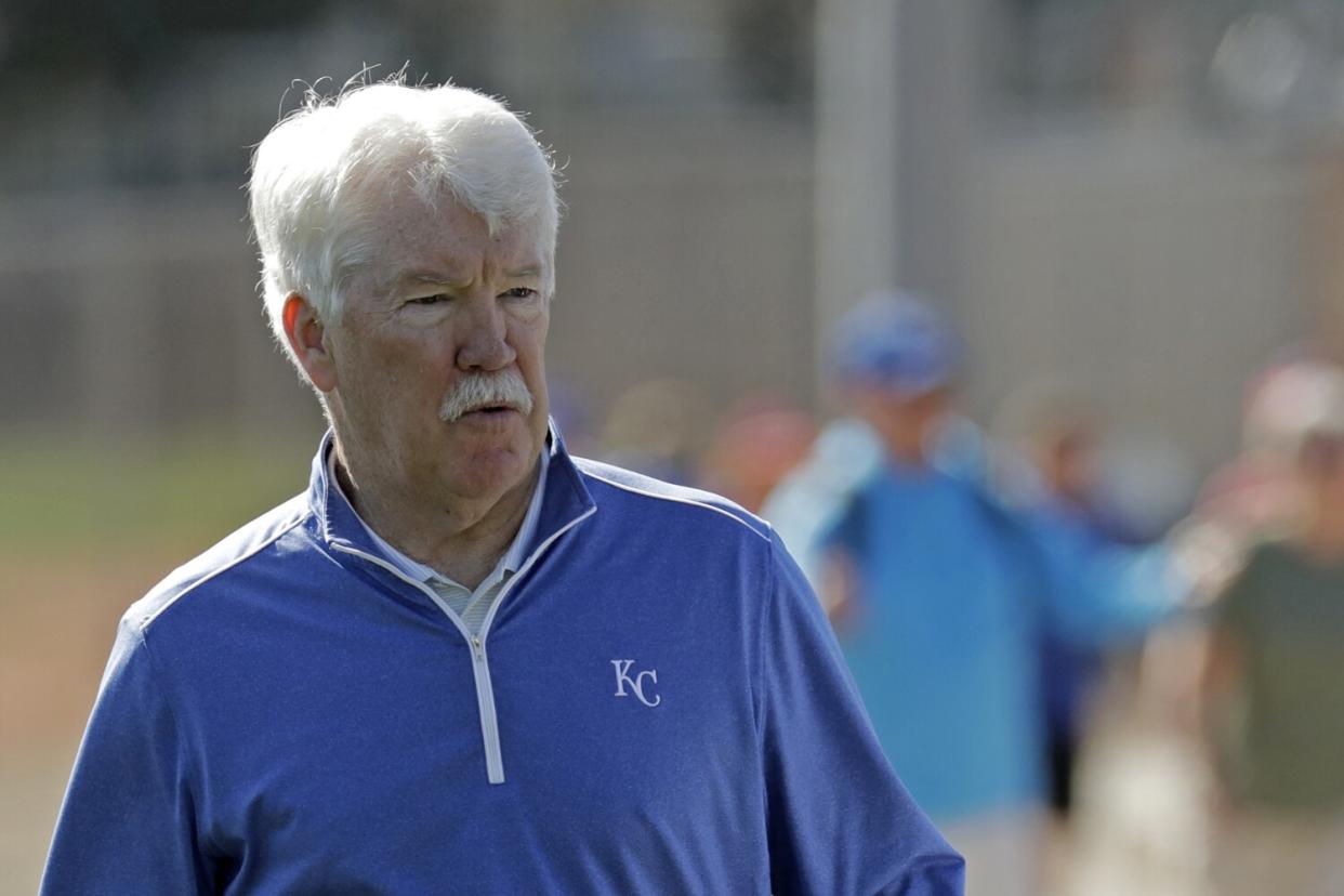 Kansas City Royals owner John Sherman watches a workout during spring training.