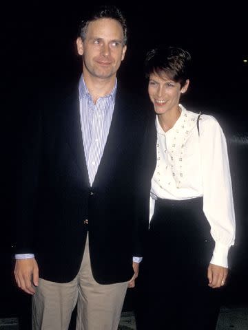 <p>Ron Galella, Ltd./Ron Galella Collection/Getty</p> Christopher Guest and Jamie Lee Curtis attend the "Baby Boom" Beverly Hills Premiere in October 1987.