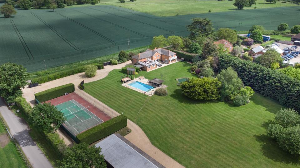 Home with tennis court