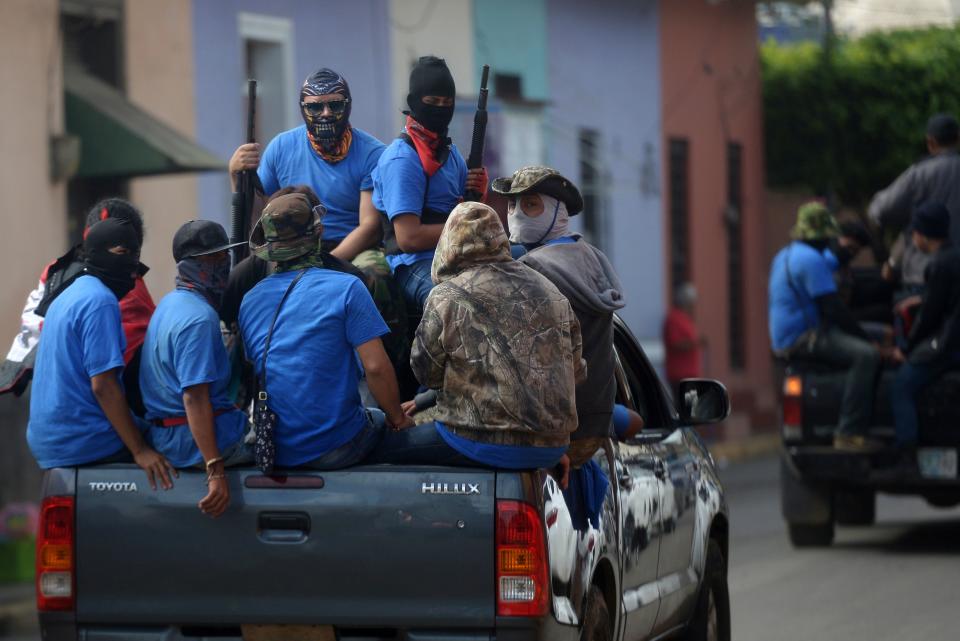 Members of a paramilitary group ride through the streets of the Nicaraguan city of Masaya following clashes with anti-government protesters earlier this month. (Photo: MARVIN RECINOS via Getty Images)