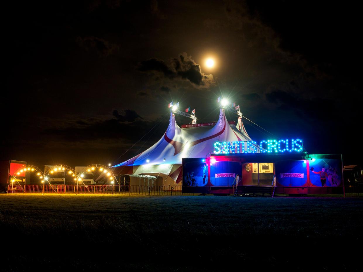 Sheerness, Kent, UK. 30th Aug, 2023. UK Weather: the stunning full super blue moon seen above Santus Circus tent in Sheerness, Kent this evening. Credit: James Bell/Alamy Live News