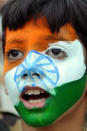 Indian school children perform during celebrations on the eve of Independence Day at India-Pakistan Wagah Border Post on August on 14. Pakistan celebrates Independence Day on August 14 and India on August 15. AFP PHOTO/NARINDER NANU