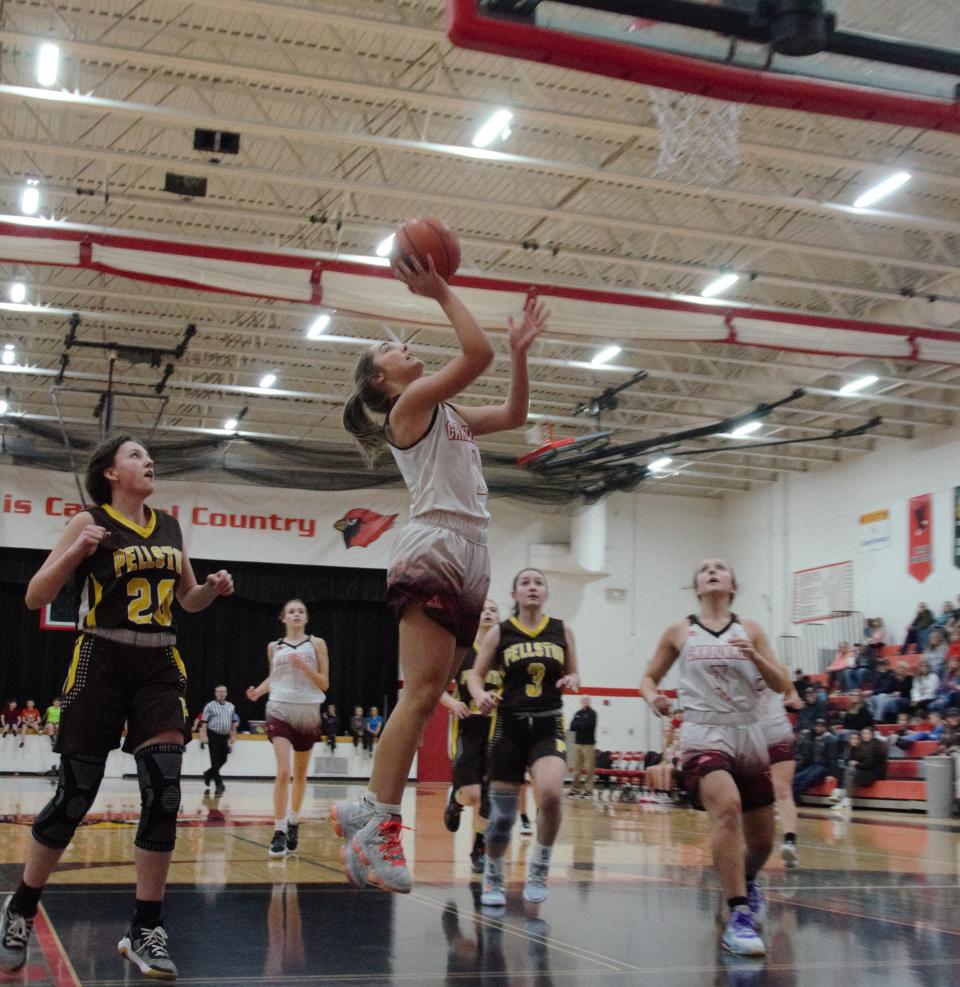 Jocelyn Tobias shoots a layup during a matchup between Johannesburg-Lewiston and Pellston on Wednesday, February 1.