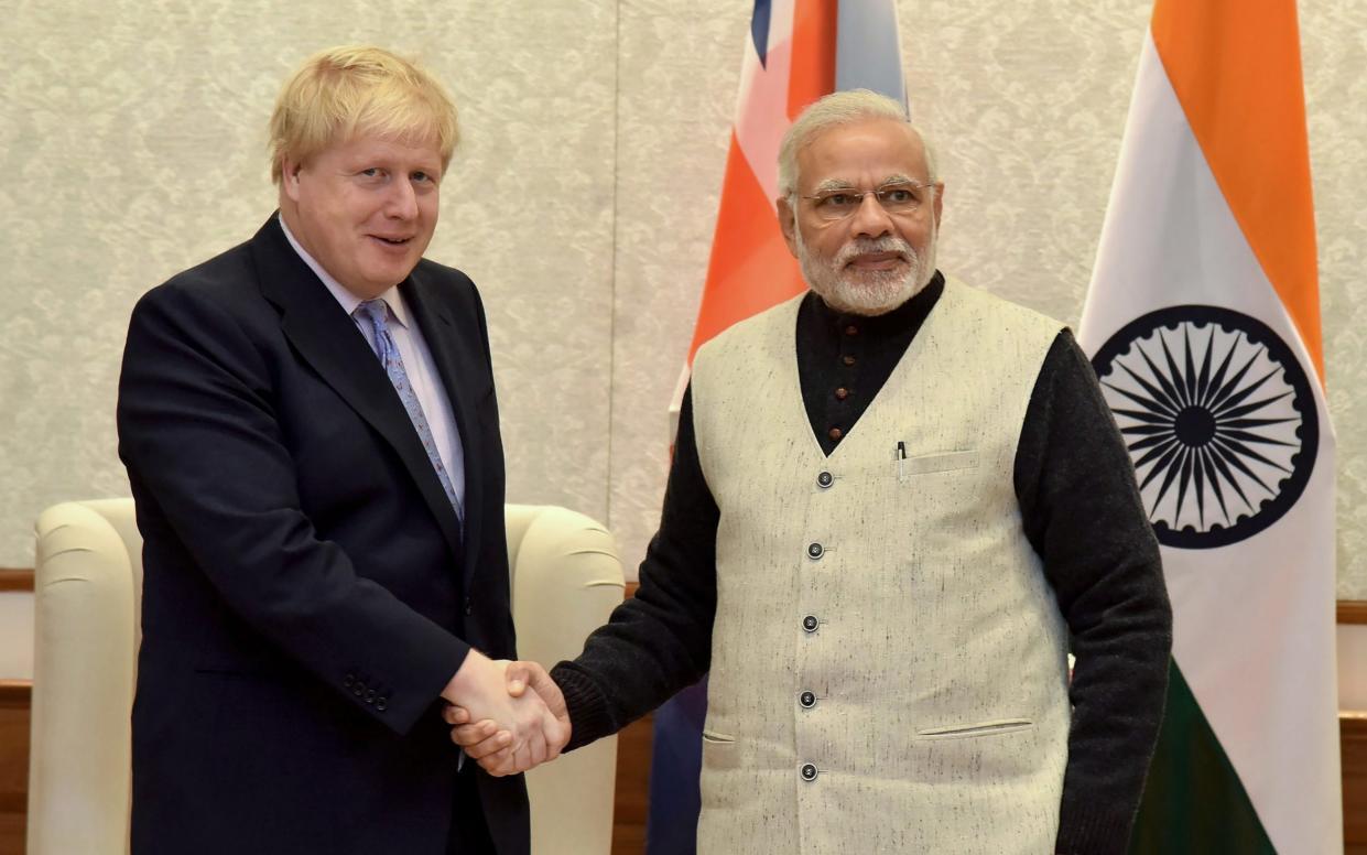 Boris Johnson shakes hands with Indian prime minister Narendra Modiv in New Delhi, 2017 - AFP via Getty Images