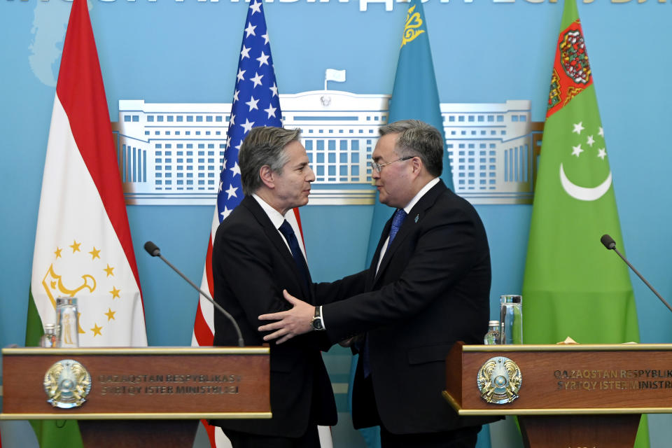 United States Secretary of State Antony Blinken, left, and Kazakhstan's Foreign Minister Mukhtar Tileuberdi greet each other at the end of a joint press conference following a US-Central Asia (C5+1) Foreign Ministers meeting at the Ministry of Foreign Affairs, in Astana, Kazakhstan, Tuesday, Feb. 28, 2023. (Olivier Douliery/Pool Photo via AP)