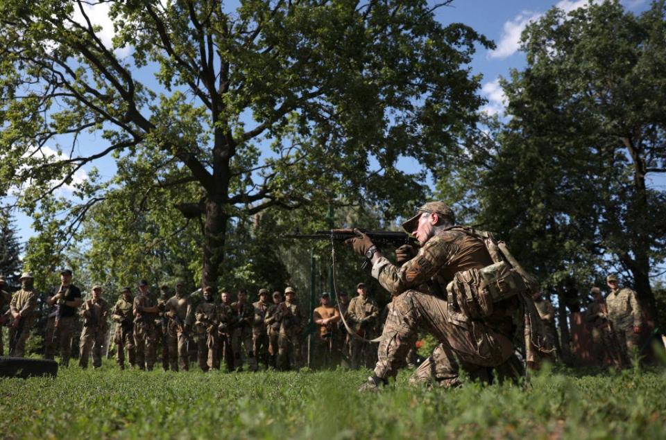 Recruits of the 3rd Separate Assault Brigade take part in military training at one of the training bases in Kyiv, on June 18, 2024, amid the Russian invasion in Ukraine. (Photo by Anatolii STEPANOV / AFP) (Photo by ANATOLII STEPANOV/AFP via Getty Images)